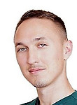 Врач Замятин Роман Георгиевич